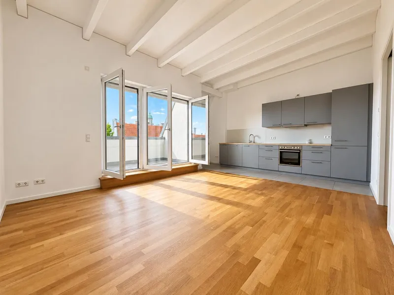Schöne Neubau Dachgeschosswohnung mit offenen Wohnküche und Südterrasse — photo 1